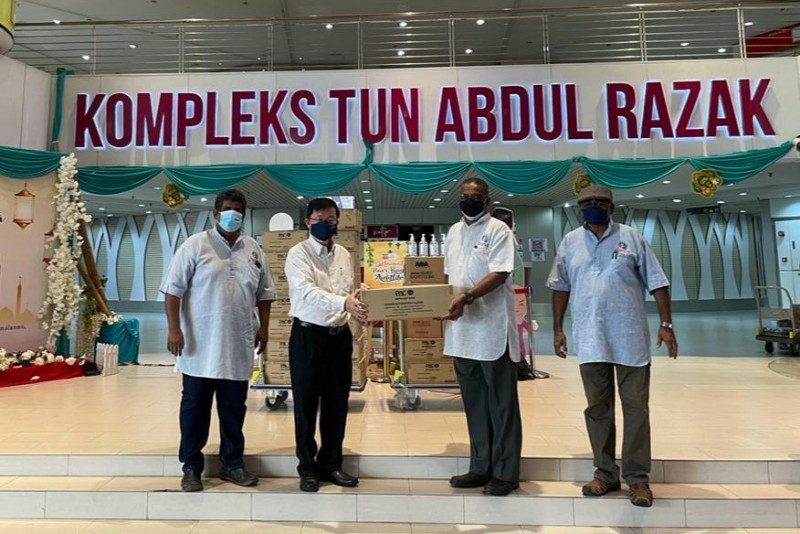 Komtar donates sanitisers, 20,000 masks to needy families