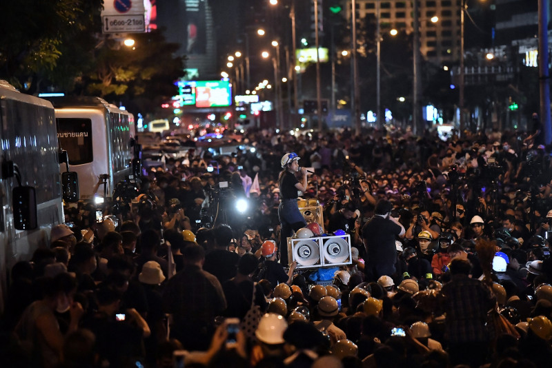 Dozen Thai student activists charged with royal defamation