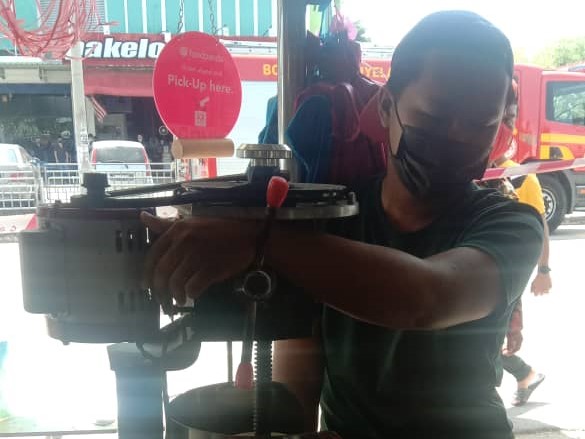 Close shave: firemen free teen’s hand from ais kacang machine