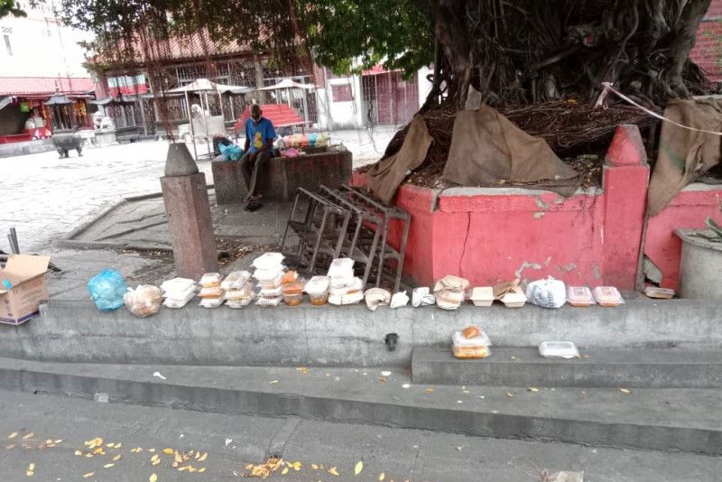 Excess food donations dumped outside Penang temple