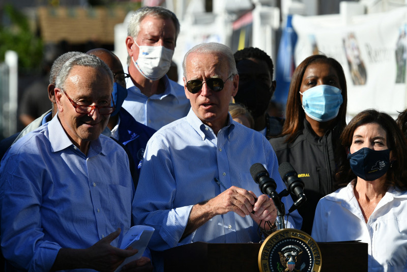 Biden warns of climate change ‘code red’ in visit to storm damage