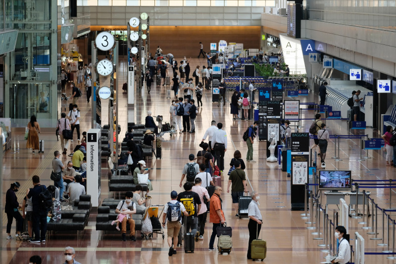 Japan eases travel curbs for fully vaxxed business visitors, students