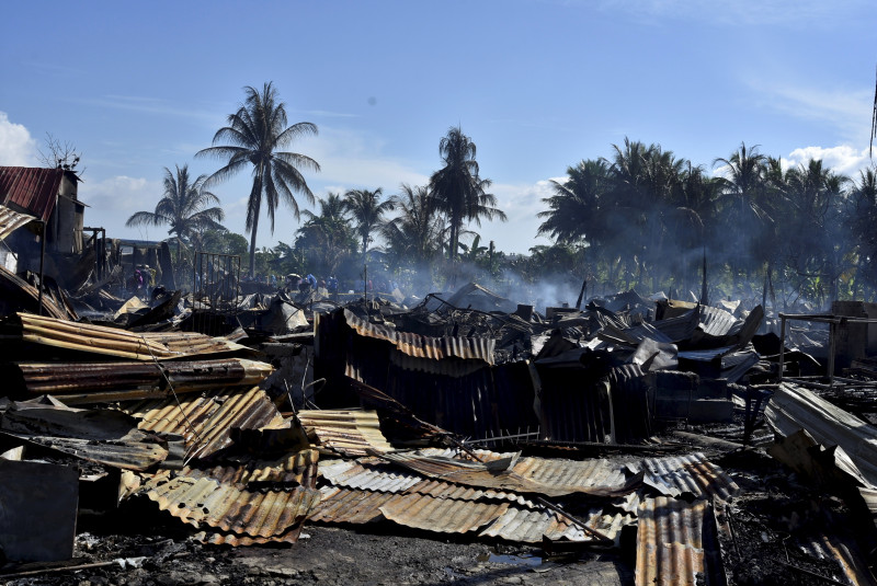 Couple found charred, seven others burned in Tawau blaze