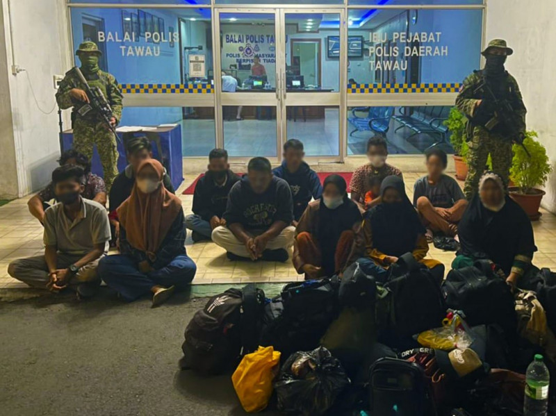 Military unit detains 14 Indonesians for entering Sabah without documentation