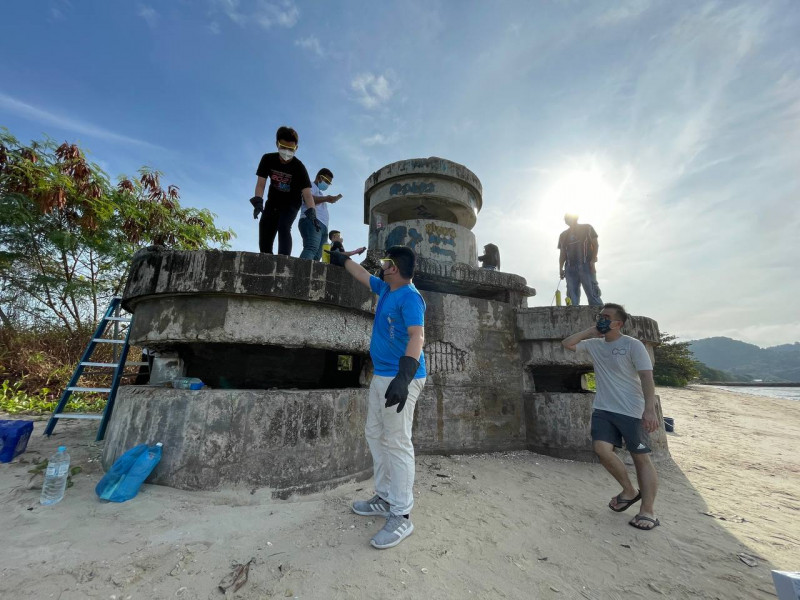Penang youth groups clean up historic pillbox targeted by vandals