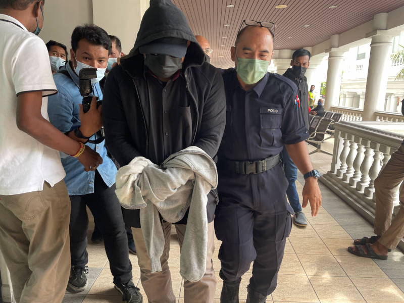 Duo charged in court for releasing Macau scam suspects