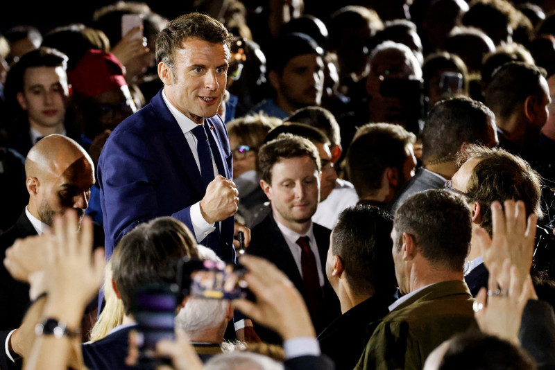 Macron defends pensions shift as French campaign brawl heats up