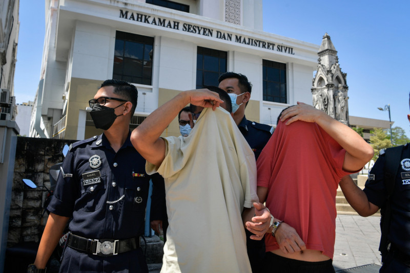 Two local men charged over murder of Indonesian national