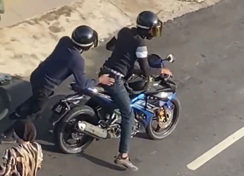 Three men charged over robbery caught on video