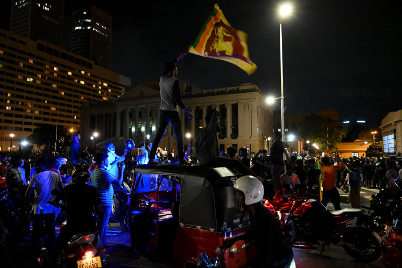 Sri Lanka asks experts to plan debt restructure as protests rage