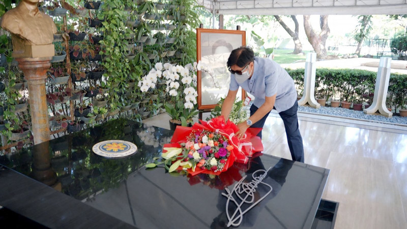 Philippine election winner Marcos visits dictator father’s grave