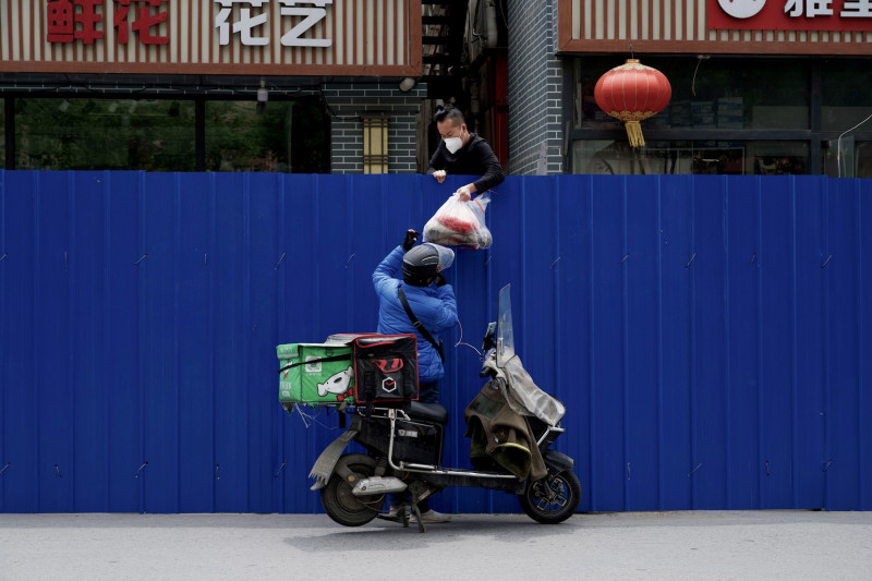 China’s Harbin reverts to Covid-19 curbs on public life as cases surge