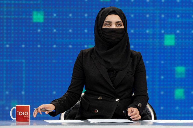 Afghan women TV presenters cover faces on air, after previous defiance