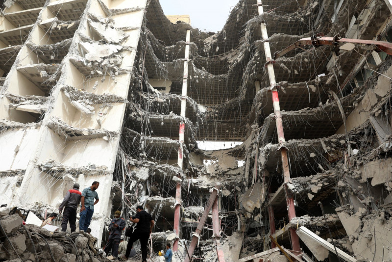 Iran police tear-gas protesters after building collapse