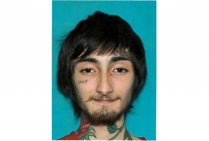 July 4 gunman charged in US with seven counts of murder