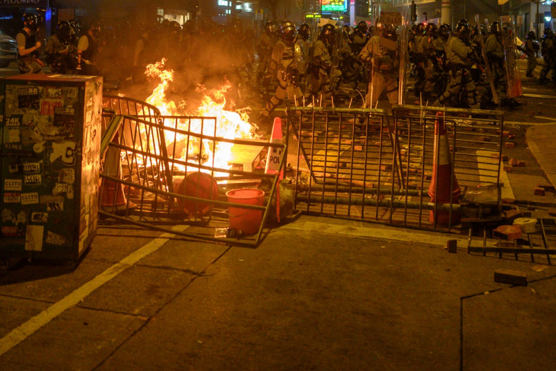 Hong Kong court jails two for clash that led to rare protest death