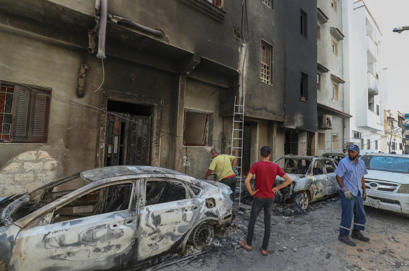 Rival Libya leaders play blame game after Tripoli clashes kill 32