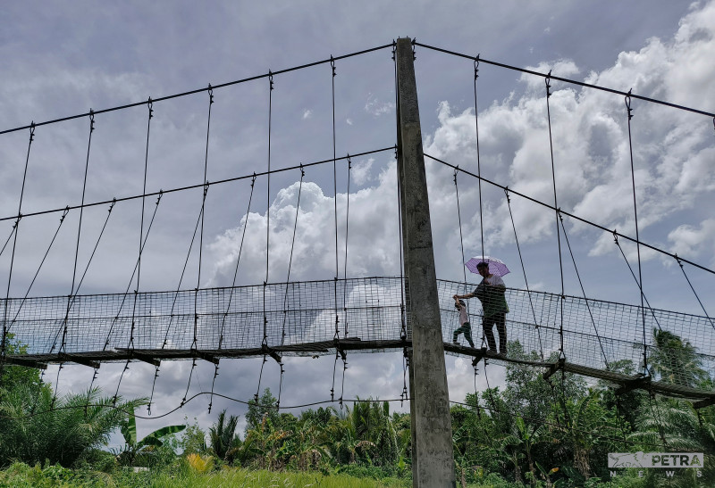 Villagers continue to use beat-up bridge nine months after repairs promised 