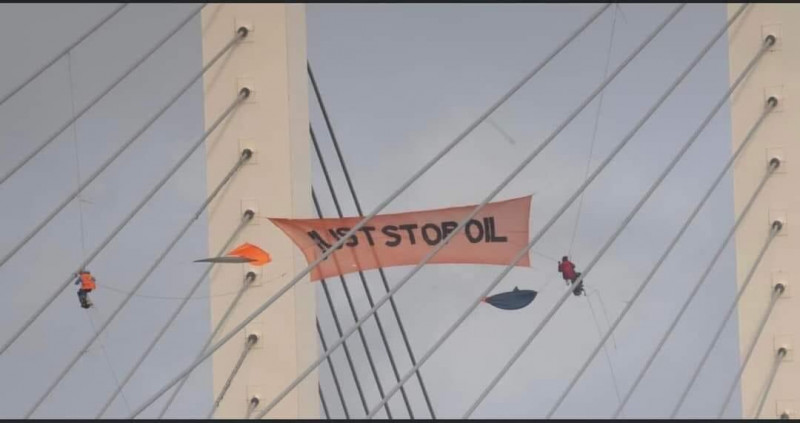 Climate protesters scale major UK bridge