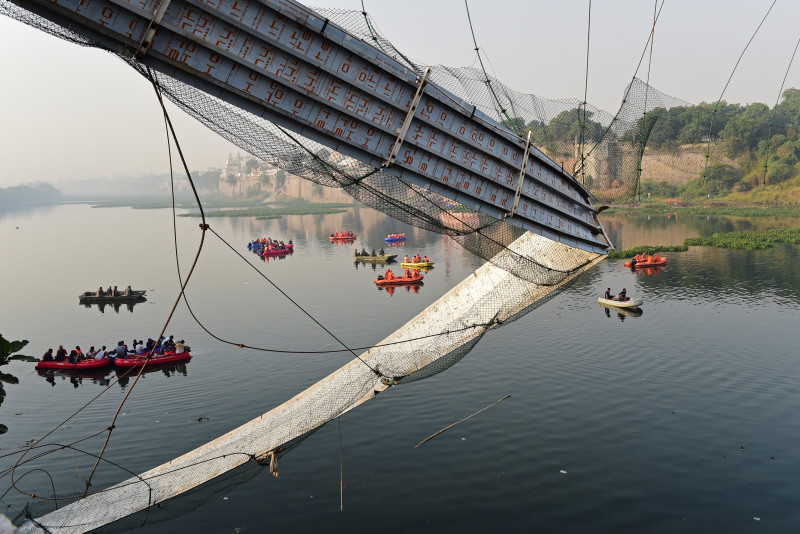 Indian cops arrest nine after bridge collapse kills at least 137