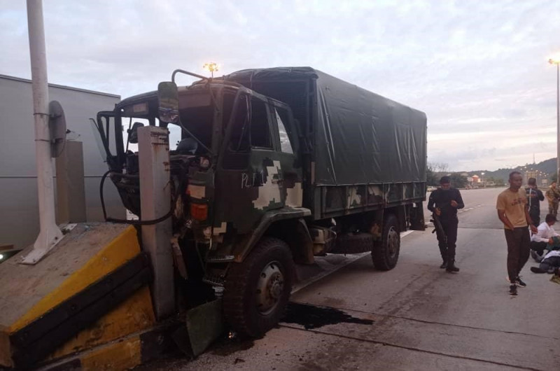 Armed forces lorry hits toll plaza divider, injuring 12