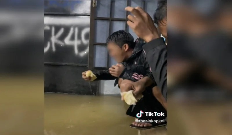 Don’t dip food in floods: health experts sound warning over viral clip