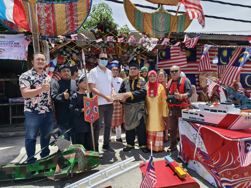 Kg Sim-Sim villagers’ patriotic spirit wins Malaysia Day decoration competition  