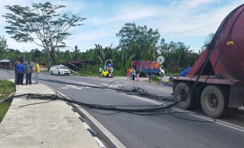 Motorcyclist dies after ramming into fallen utility pole