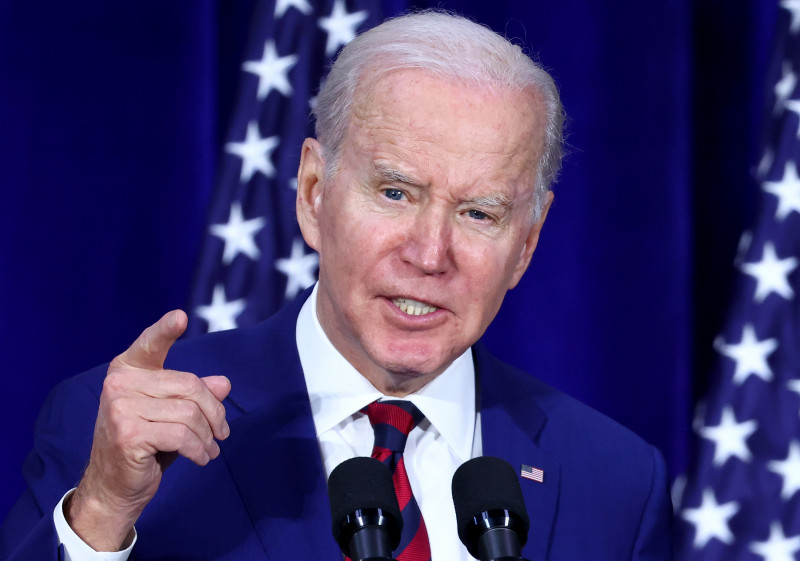 Biden mourns with mass shooting survivors, tightens gun law
