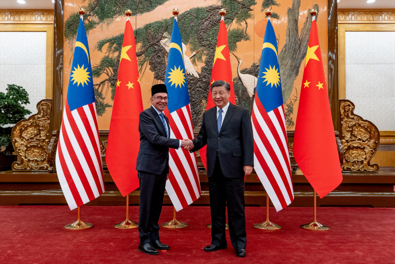 Anwar asserts Malaysia’s sovereignty even as he turns to China