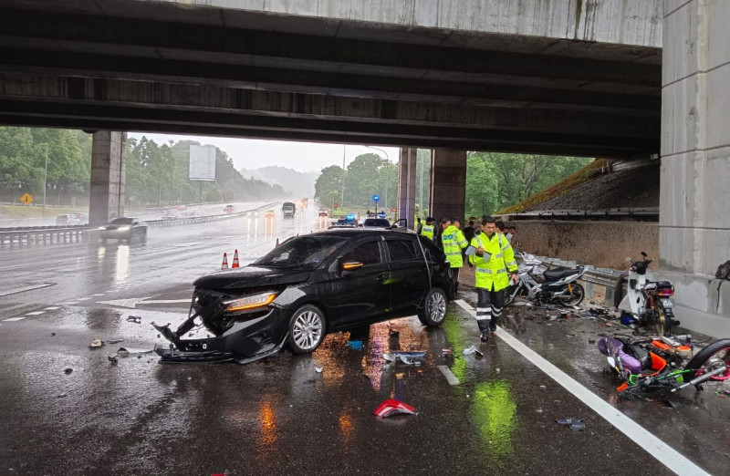 Car crashes into six motorcyclists sheltering from rain, kills three