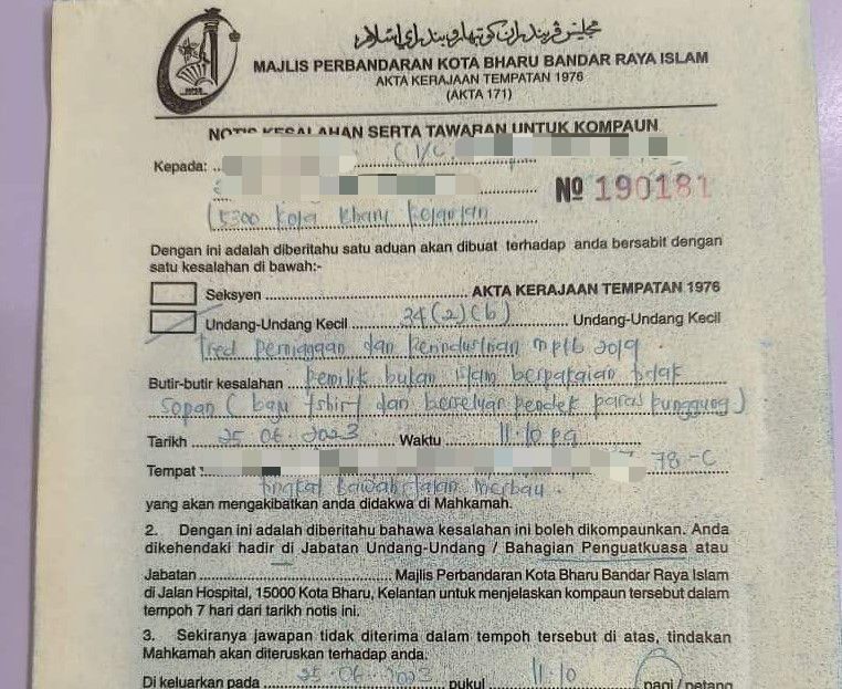 Non-Muslim woman wearing shorts in Kelantan gets compounded