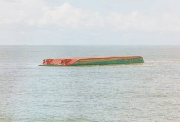 Cargo ship capsizes off Sarawak, nine missing