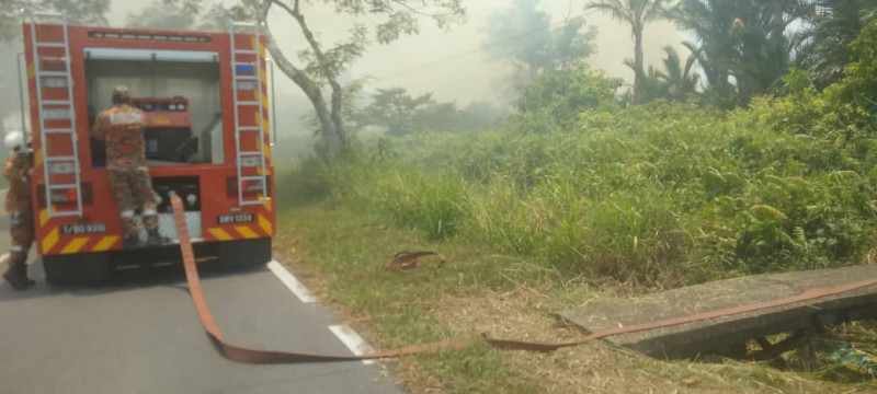 Wildfires hit close to Miri city, producing acrid smog