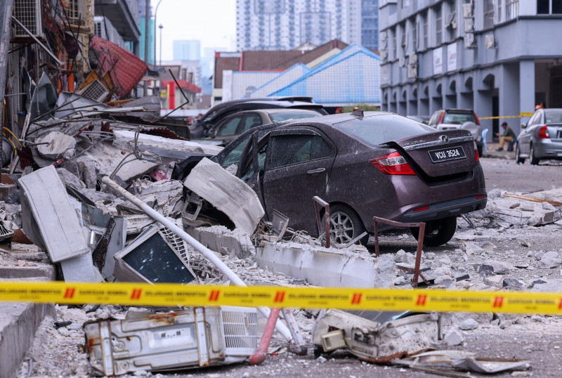 Doctor cheats death after four-storey building’s roof collapses