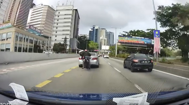 Dashcam catches car brake checking biker in KL