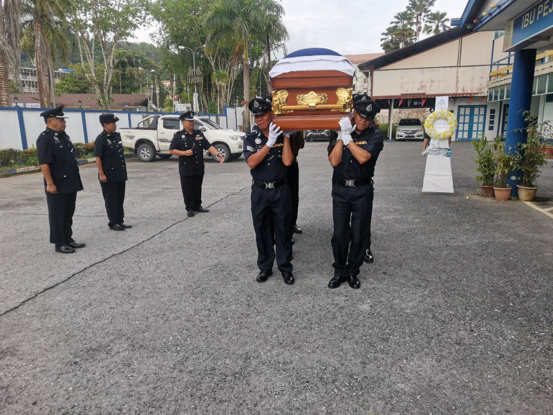 Sarawak cops bid farewell to comrade who drowned in boating accident