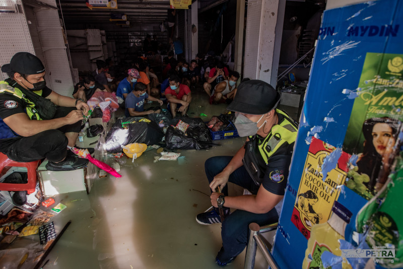 31 nabbed over looting in Taman Sri Muda
