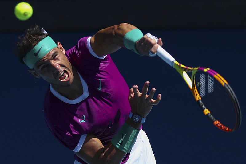 Pumped-up Nadal, home hero Barty march into Melbourne quarters