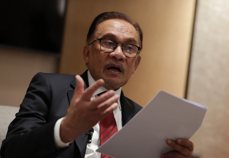 Expand your horizons, Anwar hits back at trip critics