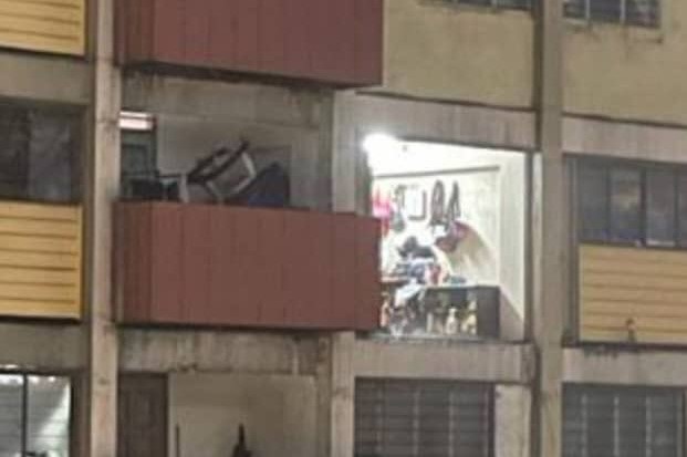 Wall of Loke Yew flat unit flies away in storm, area now secured