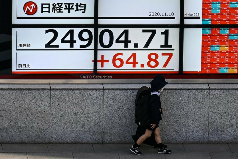 Tokyo stocks close higher with eyes on earnings