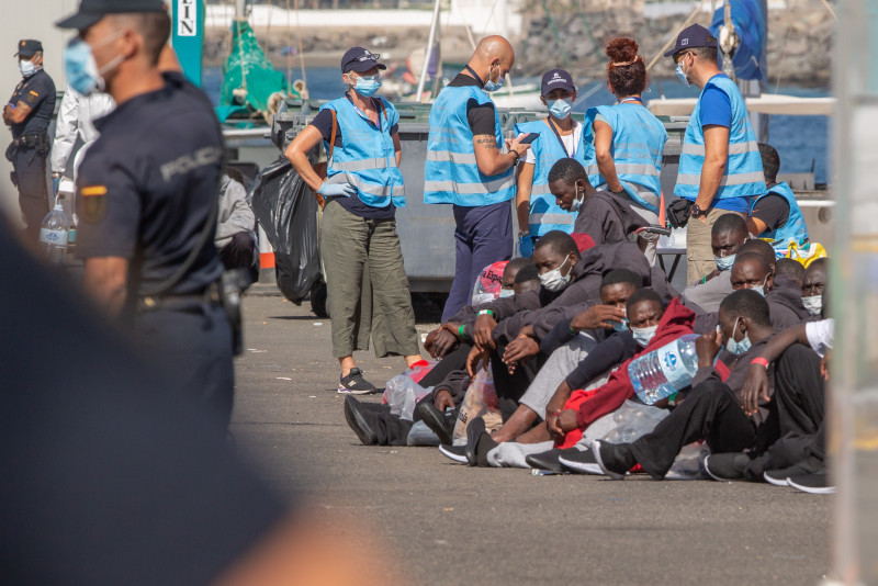 Four dead as boat carrying about 30 migrants capsizes 