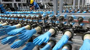 Top Glove gains push Bursa higher at lunch break