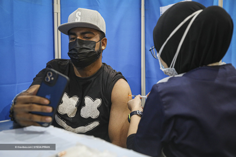 [UPDATED] Record-high 21,668 Covid-19 cases, S’gor leads with 6,278