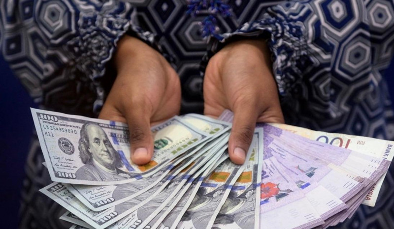 Ringgit likely to improve to 4.15 against greenback in 2022: StanChart