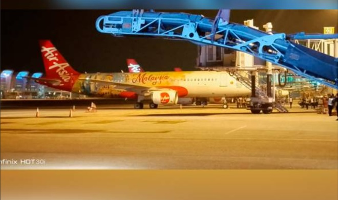 AirAsia flight makes emergency landing after engine fire