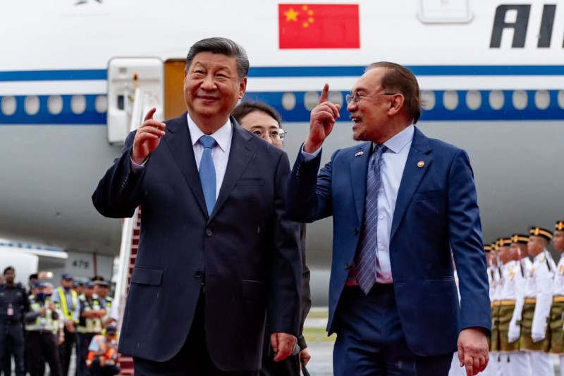Xi makes a case for free trade, presenting China as a source of ‘stability and certainty’