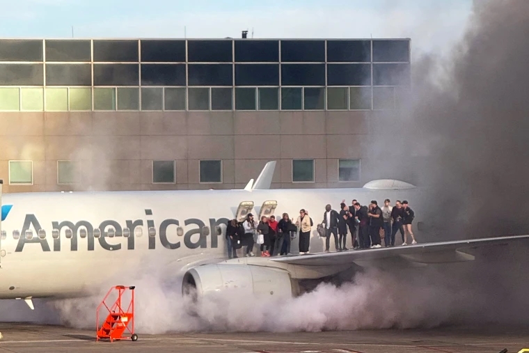 American Airlines flight catches fire in Denver
