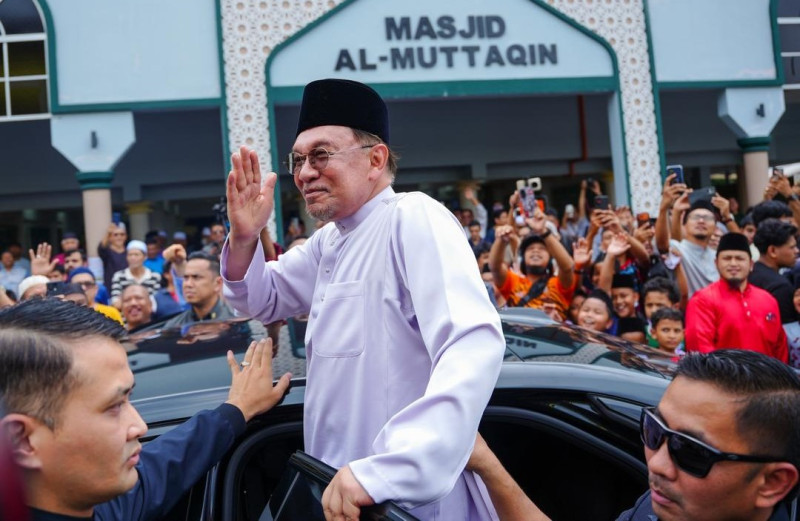 Anwar apologises over TuJu glitches, blames delays on app improvements